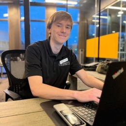 a man typing on a computer