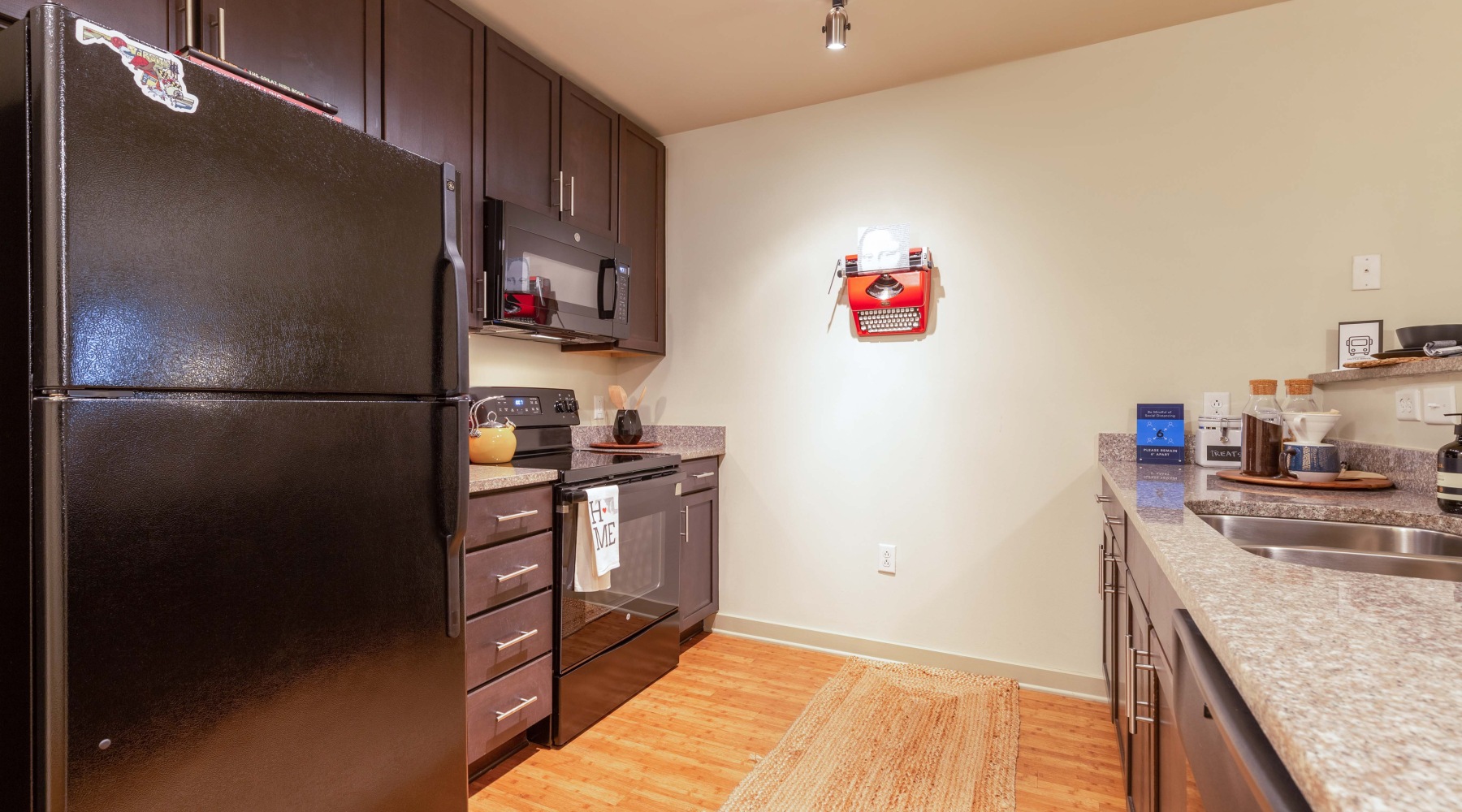 a kitchen with white cabinets
