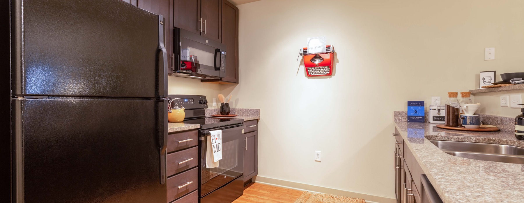 a kitchen with white cabinets